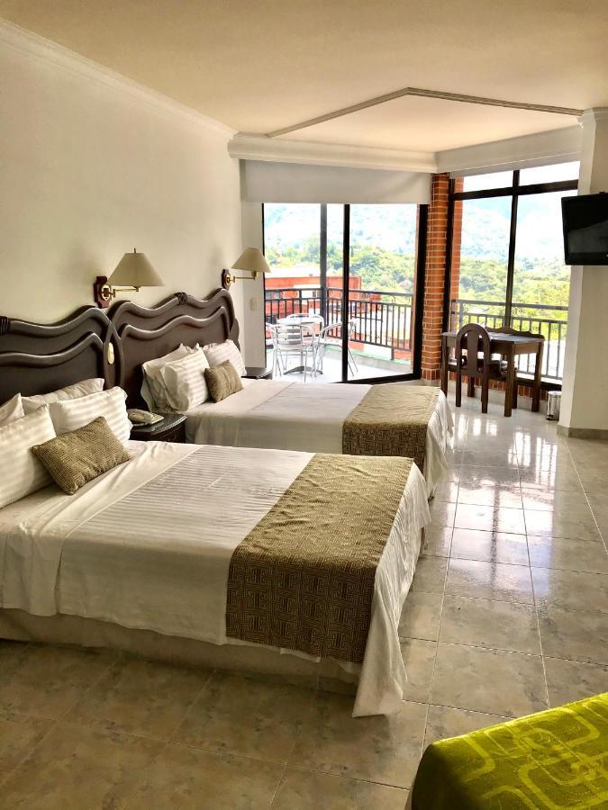 Casa Morales Hotel Internacional Y Centro De Convenciones Ібаге Номер фото
