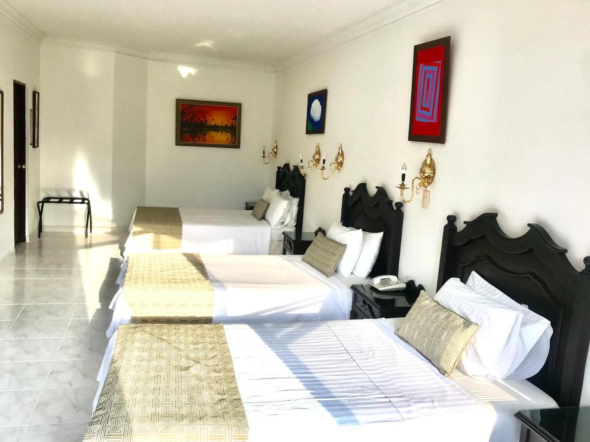 Casa Morales Hotel Internacional Y Centro De Convenciones Ібаге Номер фото